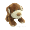 Accovacciarsi peluche cane marrone